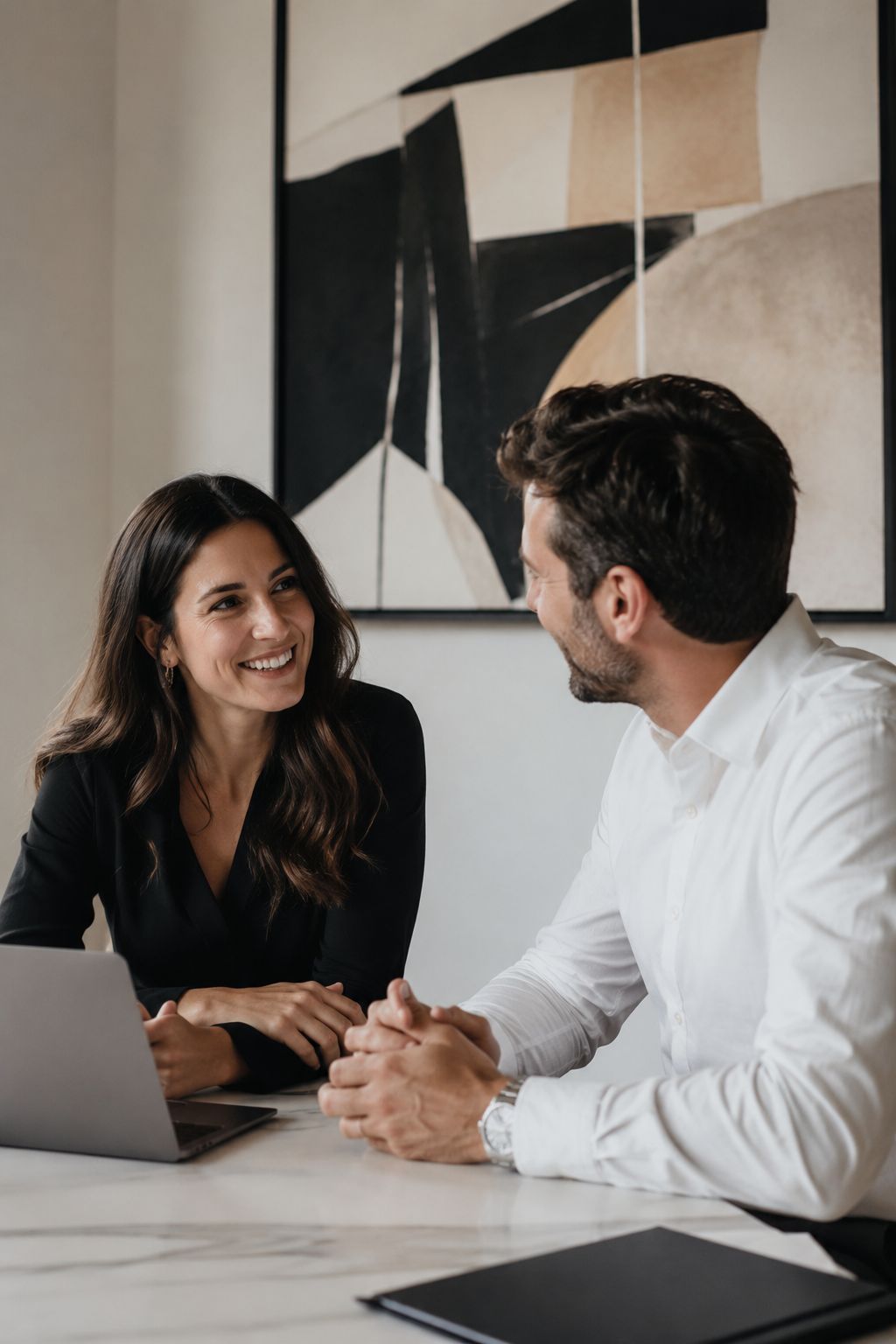 A photo of two business people having a meeting and discussing SEO