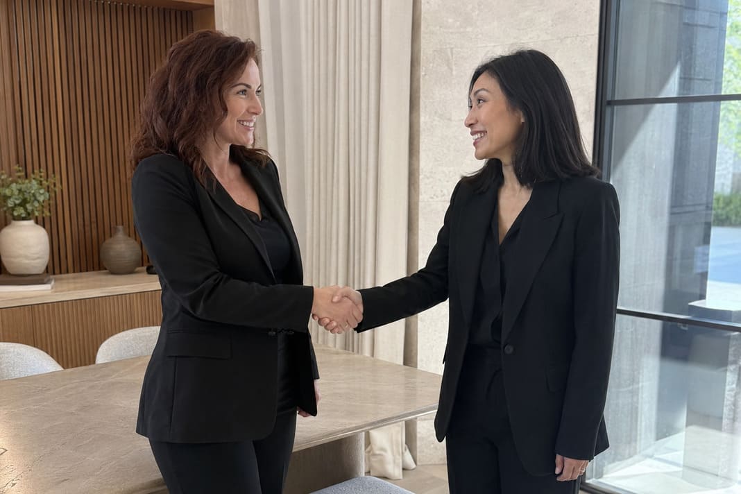 Link building experts shaking hands after planning an authority campaign