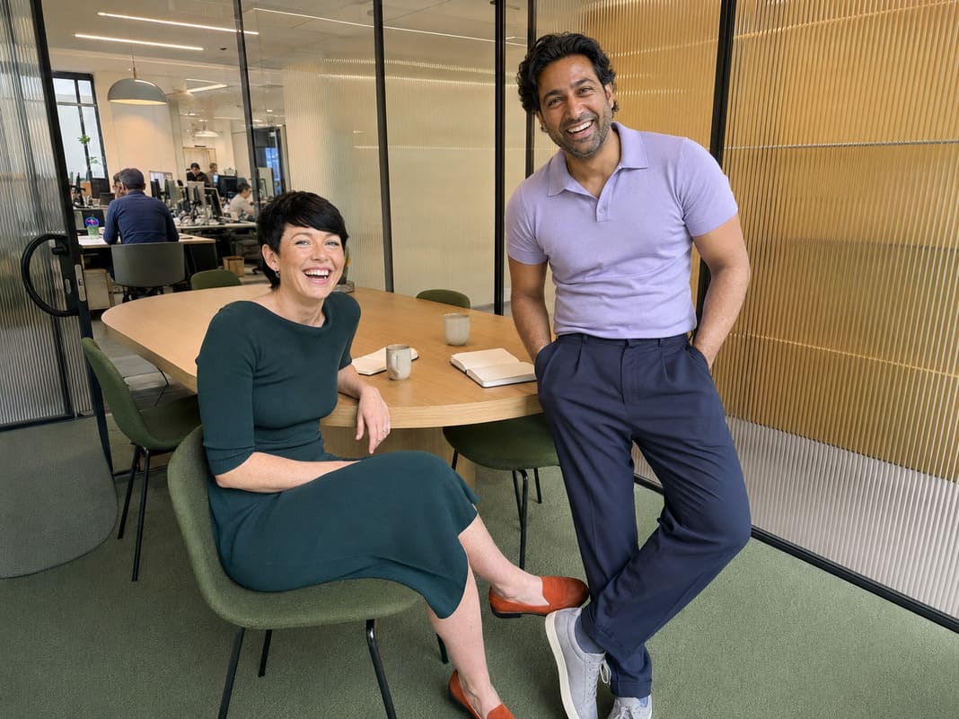 SEO agency professionals discussing digital strategy in a modern office