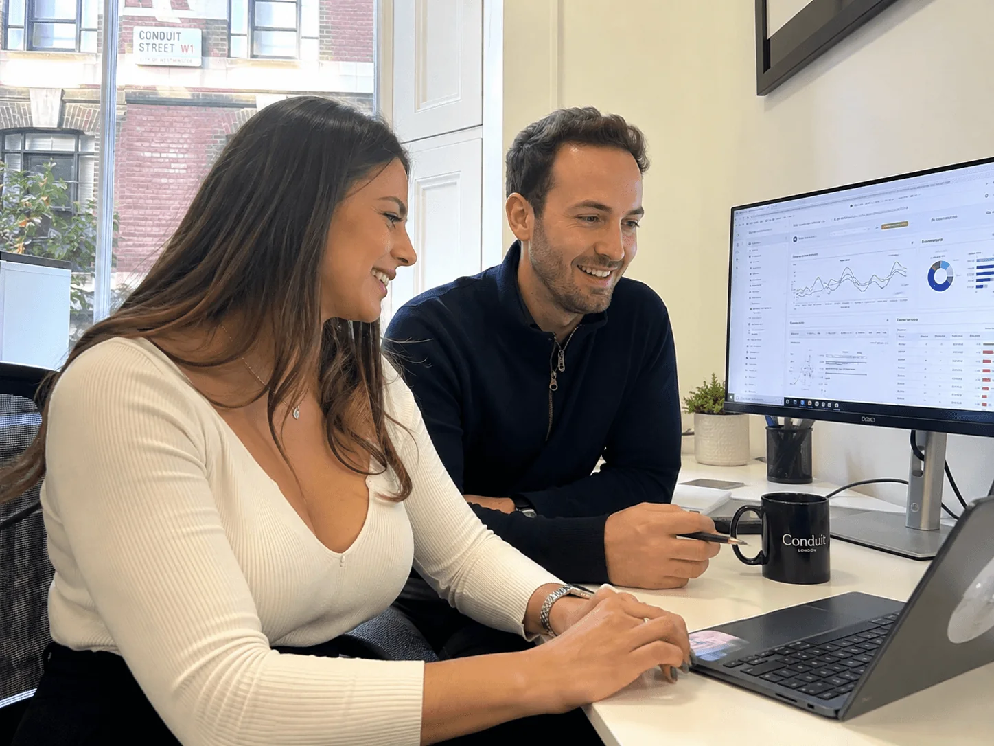 Technical SEO consultants reviewing crawl data and website performance metrics